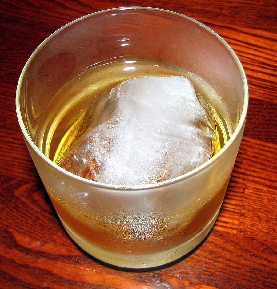 Chilled glass of plum wine served on the rocks