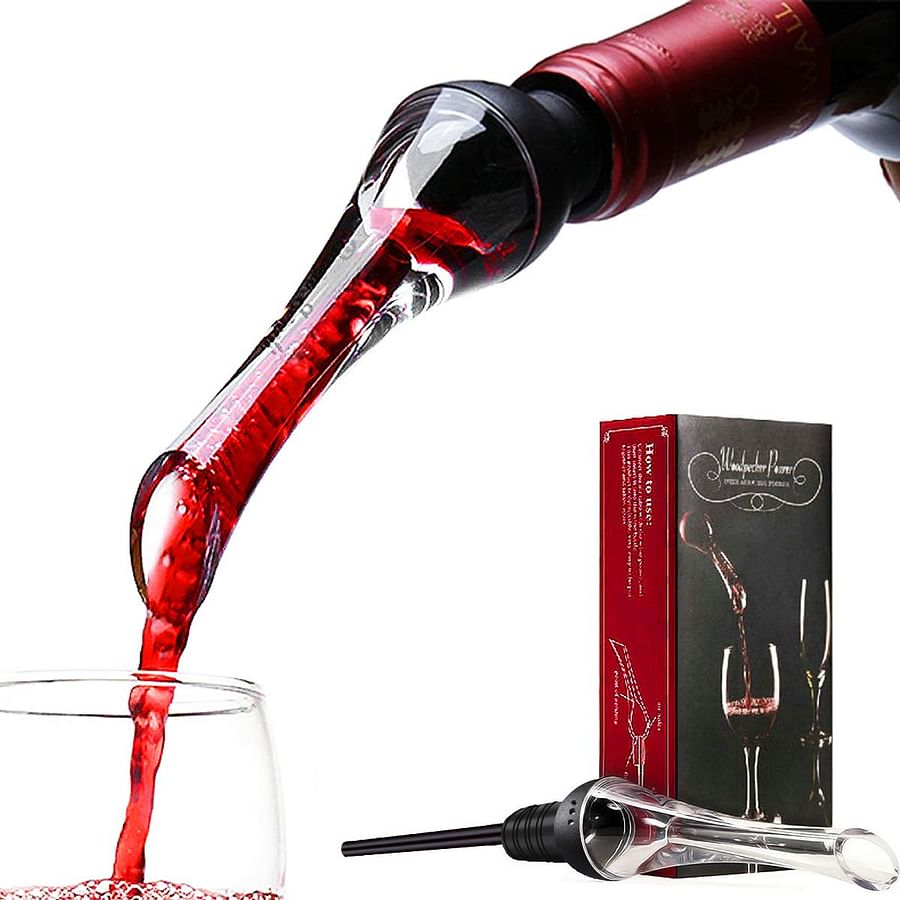 Wine aerator next to a bottle of red wine